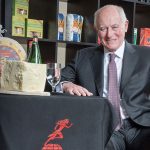 George Gellert poses with products from the Gellert Global Group.